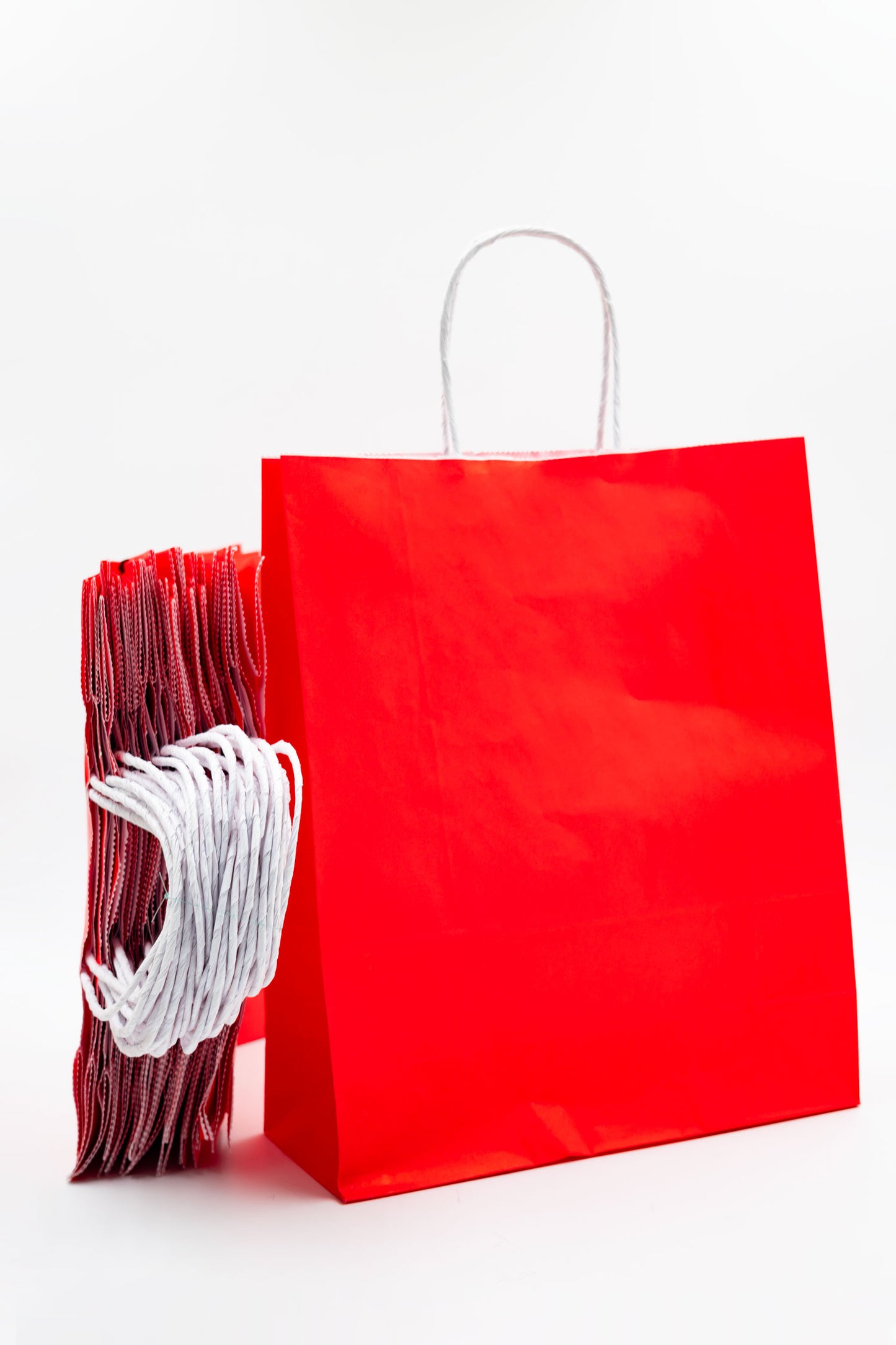 Pack de 25 Bolsas de Papel Kraft 80gr/m2 con Asas Trenzadas – Rojo