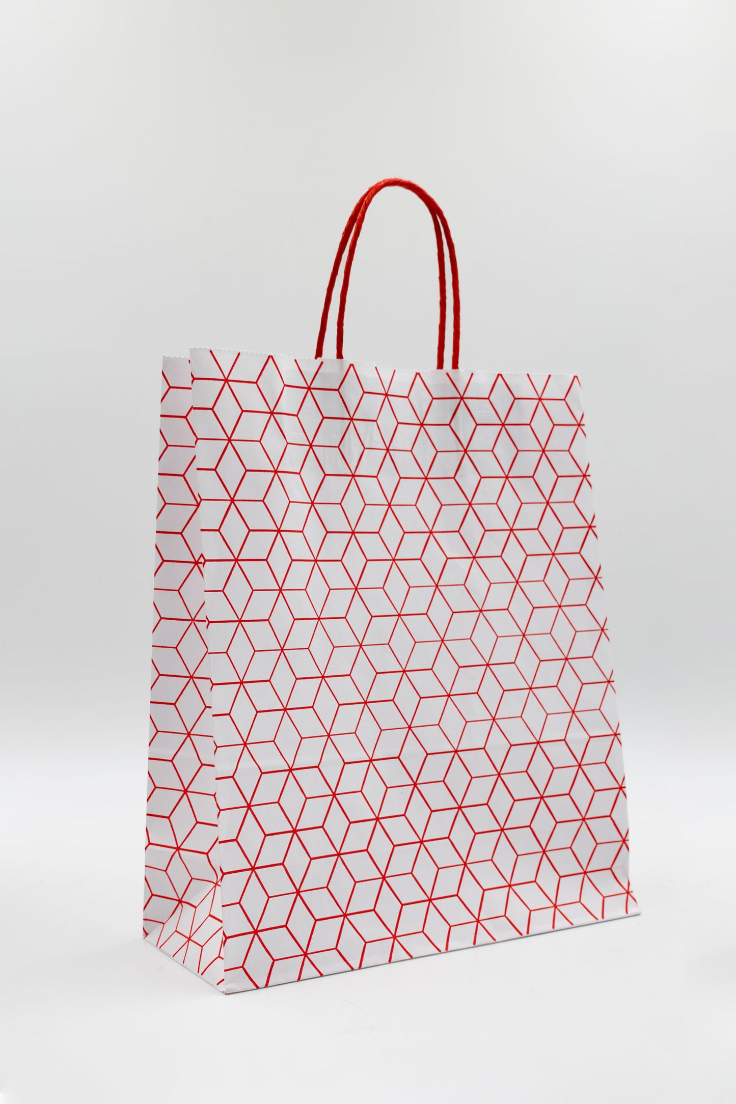 Pack de 25 Bolsas de Papel Kraft Reciclado con Asas Trenzadas y Estampado Geométrico en Rojo